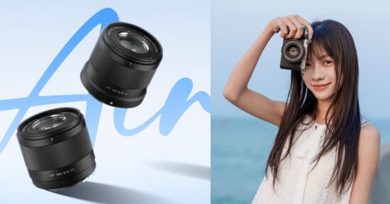 A woman with long hair smiles while holding a camera up to her eye. On the left, there are two camera lenses floating against a light blue background.