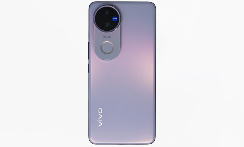 A smartphone with a gradient purple back case, featuring a circular camera module and a logo that says "vivo" at the bottom. The phone is showcased on a plain white background.